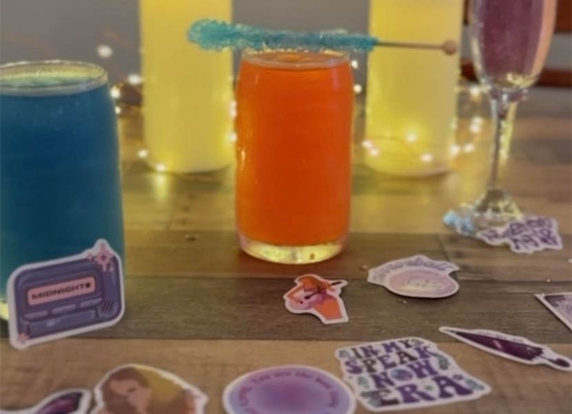 Photo of tea drinks and Taylor Swift references on a table