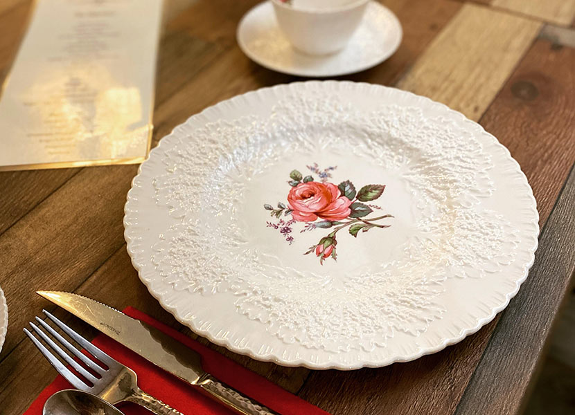 Photo of Sugar Magnolia holiday table setting with menu